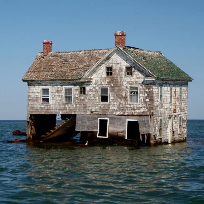 a house surrounded by water