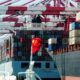 Fully-loaded container ships berth at a dock at the Port of Qingdao in Qingdao city, east Chinas Shandong province. DepositPhotos.com.