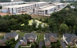 a large data center in Northern Virginia encroaches on some upscale suburban homes