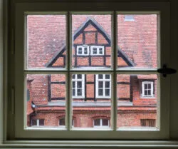 old German monastery seen through window