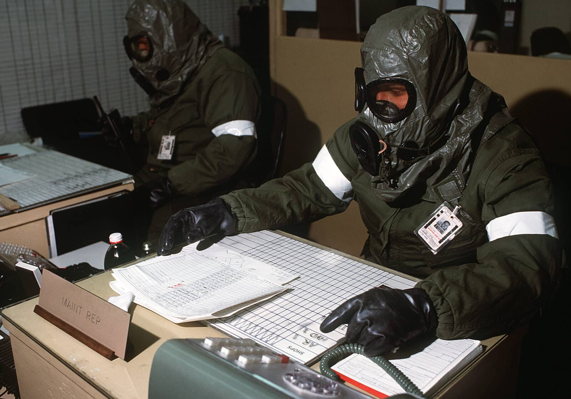 Members of the US military  wear chemical/biological warfare suits in an exercise that simulates a deployment to South Korea following an attack by North Korean forces. (Department of Defense, Wikimedia Commons)