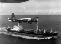 plane flying over ship Cuban Missile Crisis