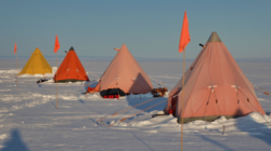 Known as pyramid tents or Scott tents, they’re essentially the same tent design used by the original polar explorers a hundred years ago, capable of withstanding winds of up to 70 miles per hour. “They’re just so good, they got the design perfect,” says the author. Image courtesy of Peter Davis.